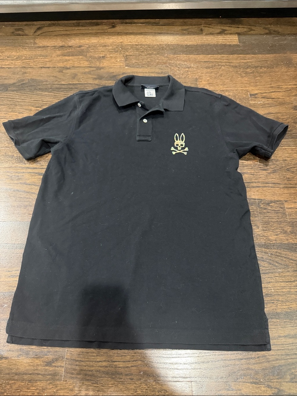 Psycho Bunny Black Polo with Olive Bunny Skull Logo